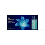 Manuka Health Immunity Elixir Shots packaging with a blue flower on a white background.