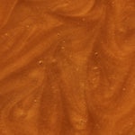 Close-up of a brown, textured surface of Manuka Health Manuka Honey Reserve MGO 1000+.