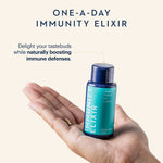 One-a-day immunity elixir bottle held in a hand with promotional text on a light beige background